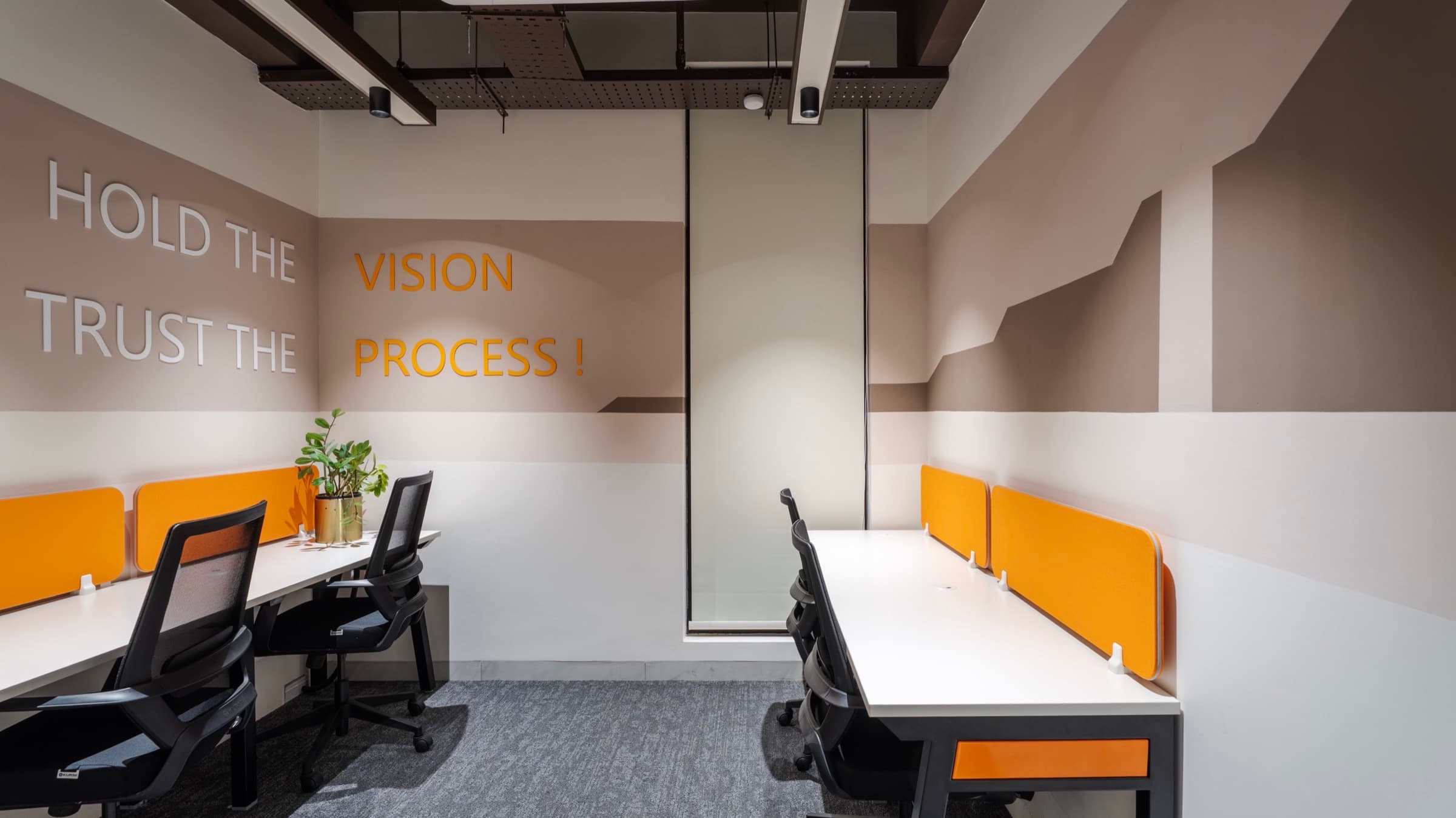 Hold The Vision Trust The Process mural in the 4 seater lake view private office at Fliqzo Coimbatore