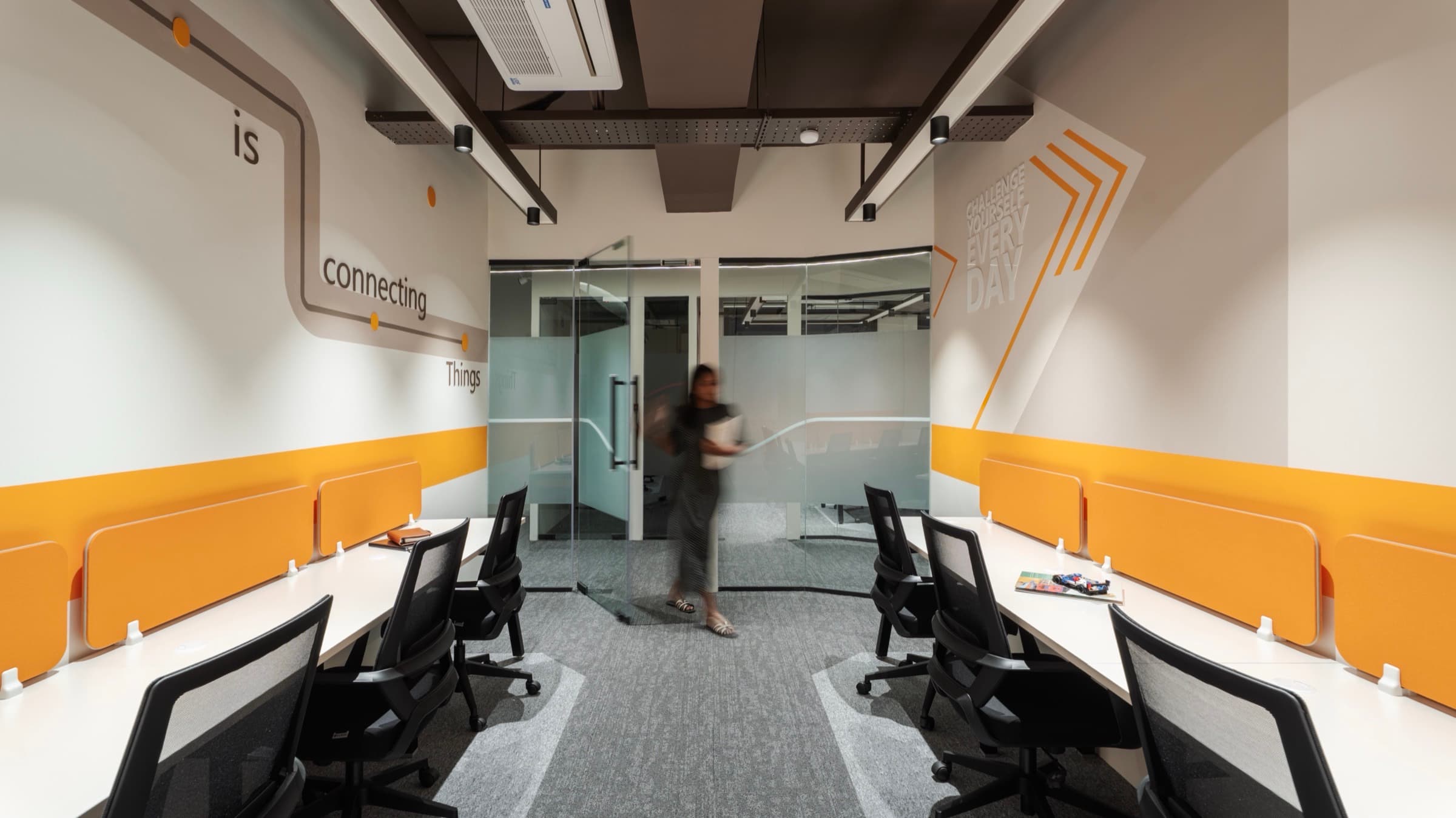 Connecting Things wall graphic and glass entrance of the 8 seater lake view private office at Fliqzo